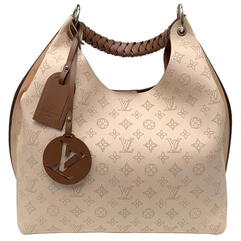 louis vuitton carmel white|Louis Vuitton mahina hobo bag.